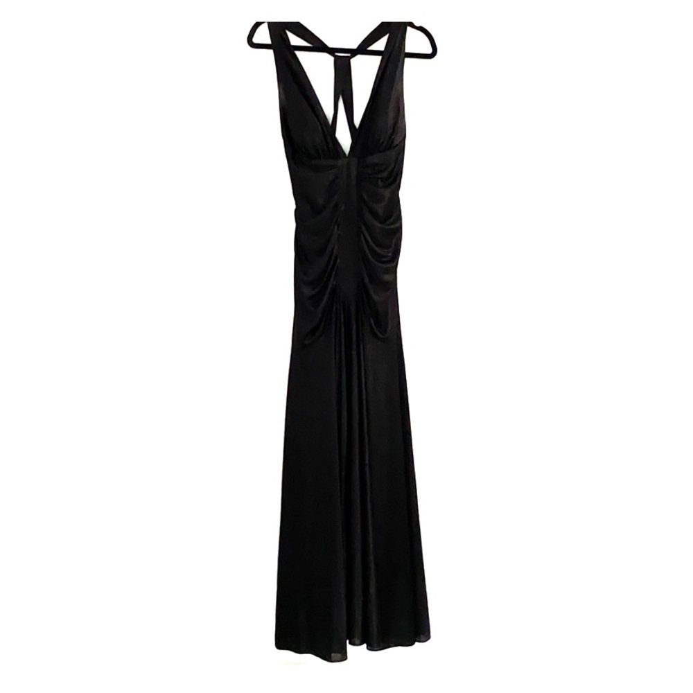 Black deep flowing gown with open back.